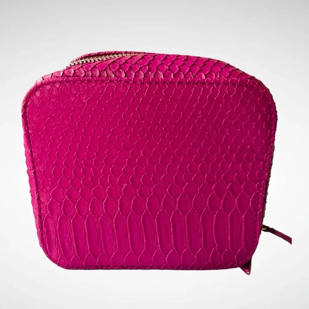 TRISH McEvoy embossed pink makeup planner